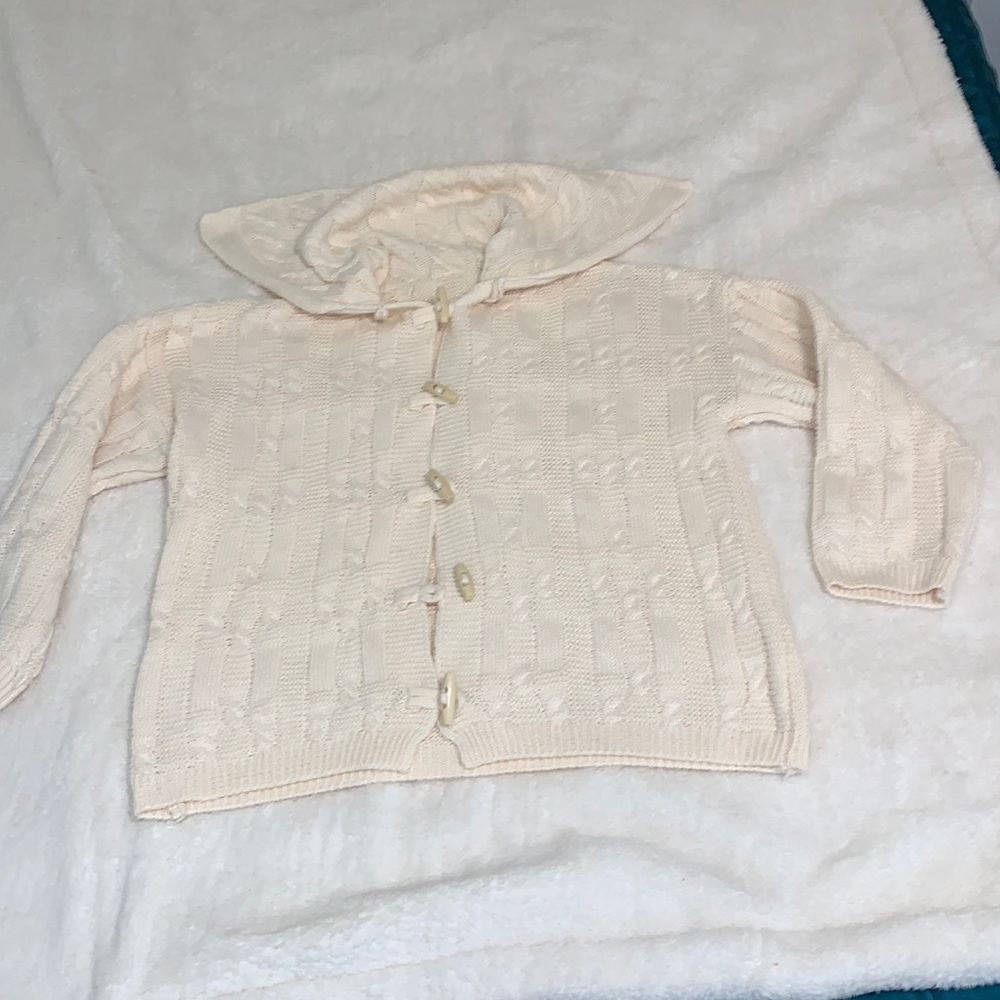 Light cream very soft and stretchy long sleeved sweater